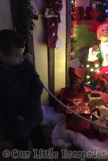 ethan elves gift wrapping grotto scene