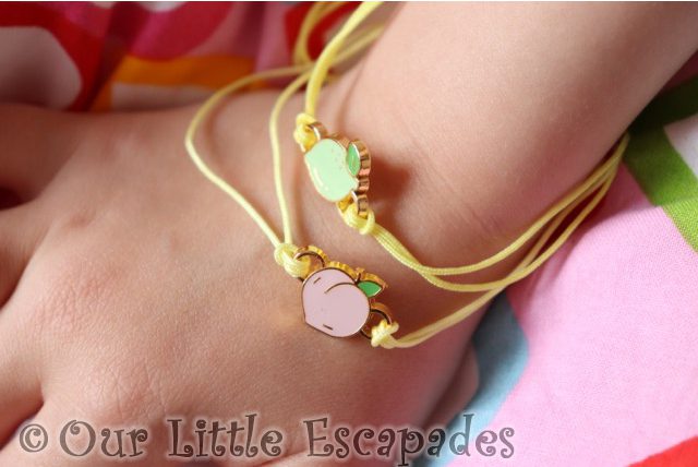 little e lucky fortune collectible bracelet peach lime charm