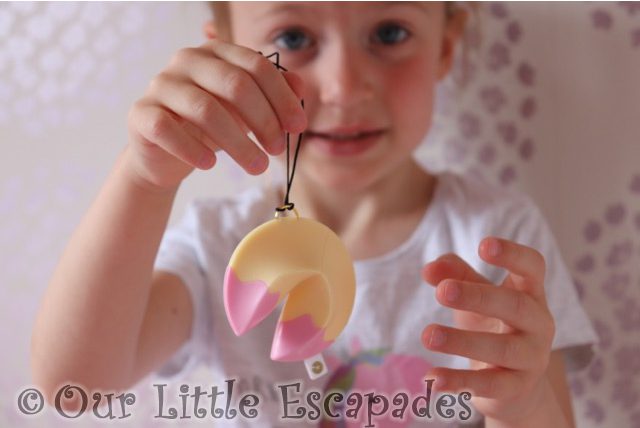 little e pink lucky fortune cookie key chain
