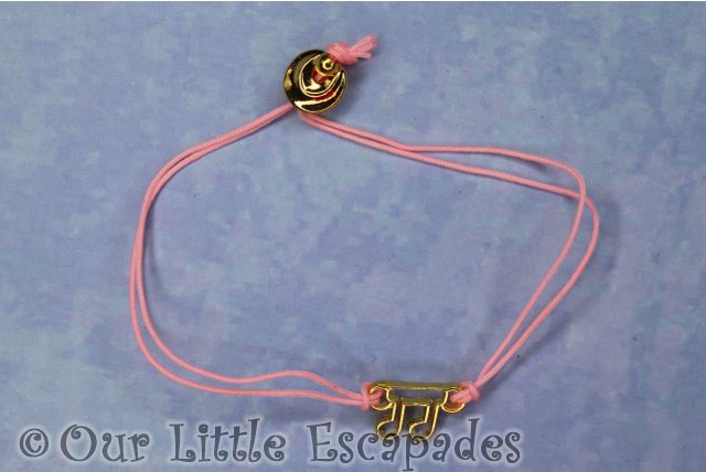 pink collectible bracelet musical note