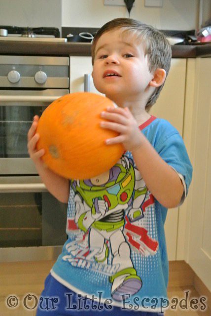 ethan holding pumpkin carving halloween 2013