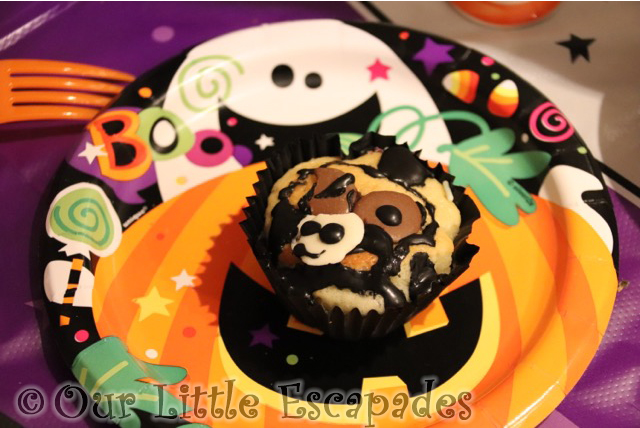 little e decorated halloween cupcake
