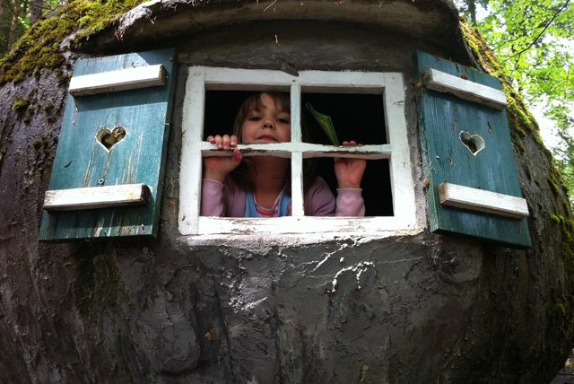 little girl treehouse window