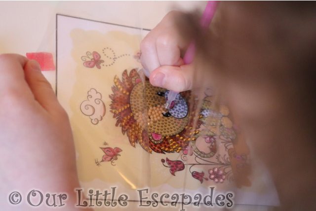 little e placing cream crystals lion template