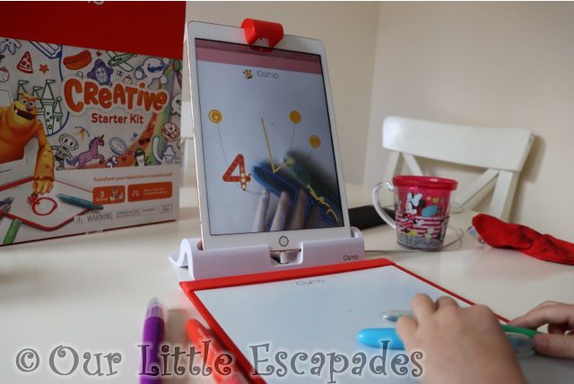 little e playing newton using markers osmo creative starter kit