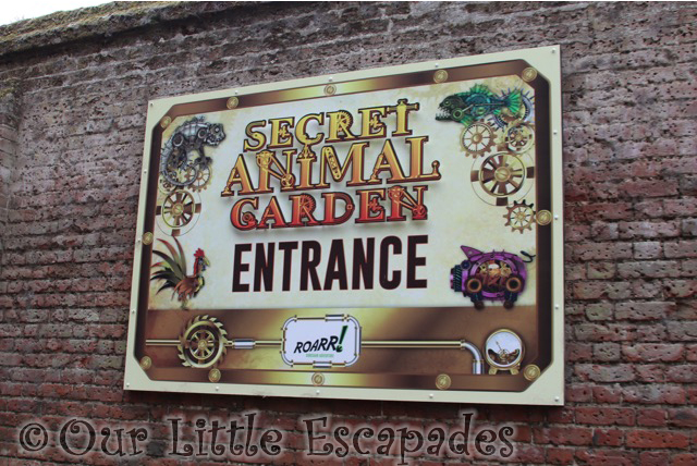 secret animal garden sign