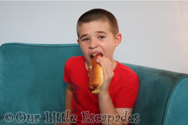 ethan eating bunlimited hot dog