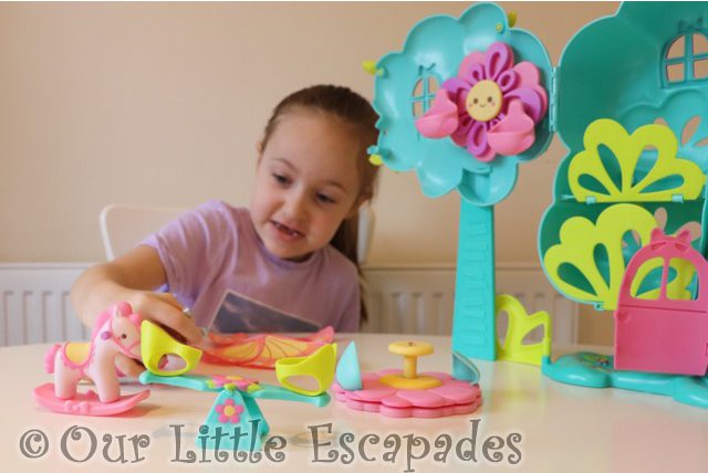 little e playing treehouse rocking horse seesaw carousel baby born surprise treehouse
