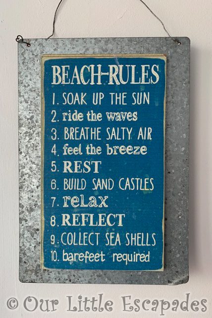 beach rules sign sunnysands beach hut