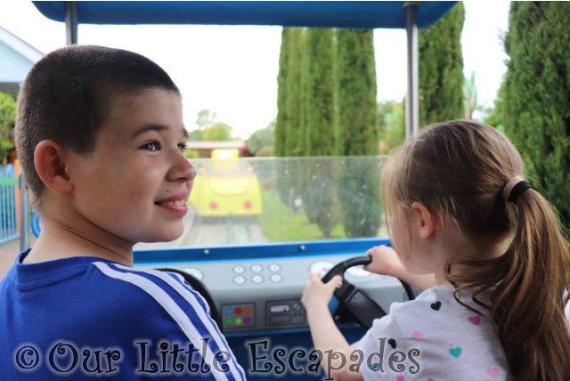ethan smiling little e driving daddy pigs car ride peppa pig world Animal Adventures