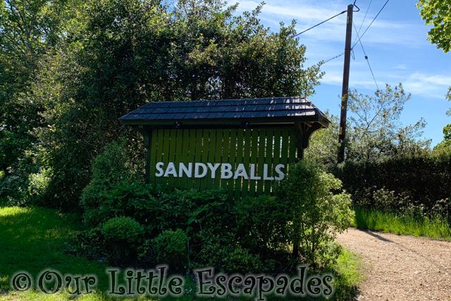 sandy balls sign away resorts