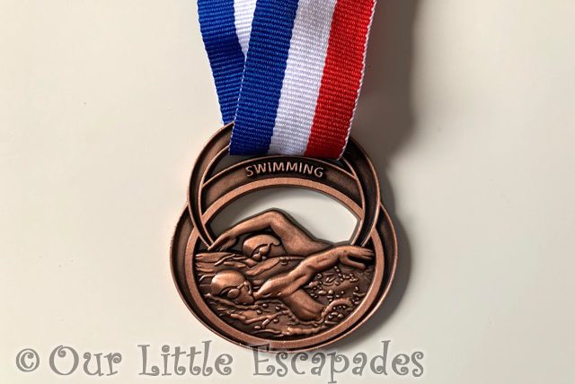 third place swimming front stroke bronze medal