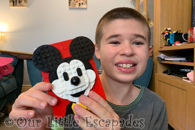 ethan holding mickey mouse lego picture