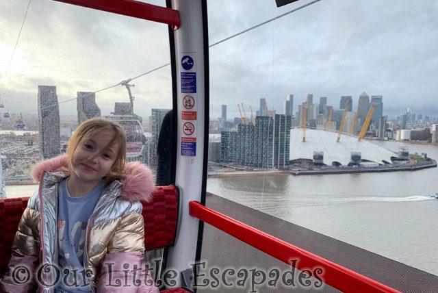 little e sitting london cable car 02 background