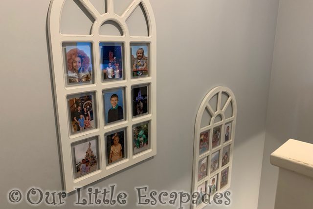 photo frames hanging hall stairwell