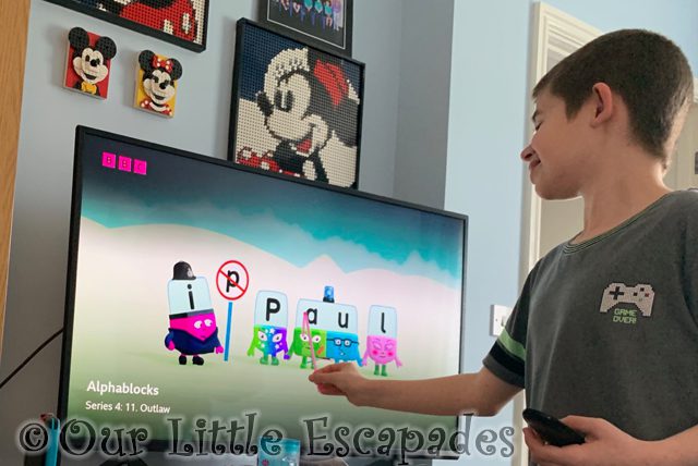 ethan pointing out alphablocks letters tv