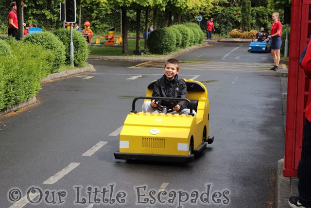 ethan driving yellow car lego city driving school legoland windsor Access Pass