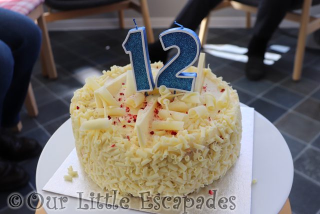 white chocolate birthday cake number candles twelve