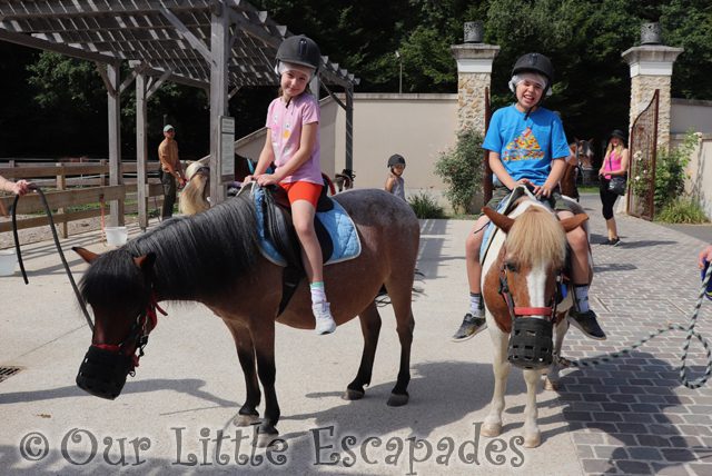 ethan little e pony rides villages nature paris