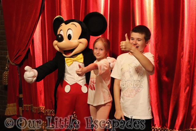 holding thumbs up ethan little e mickey mouse disneyland paris