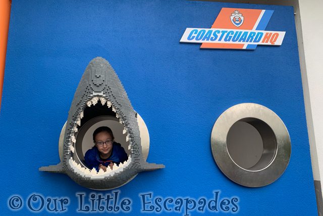 smiling little e lego shark porthole legoland coastguard hq