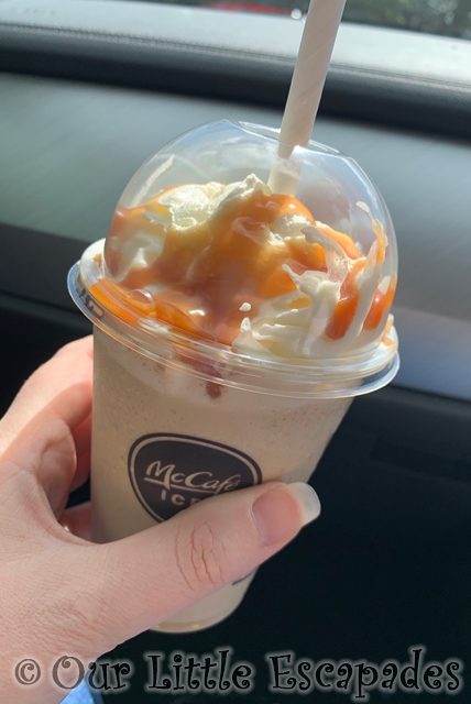 janes hand holding mcdonalds caramel iced frappe car project 365 2023